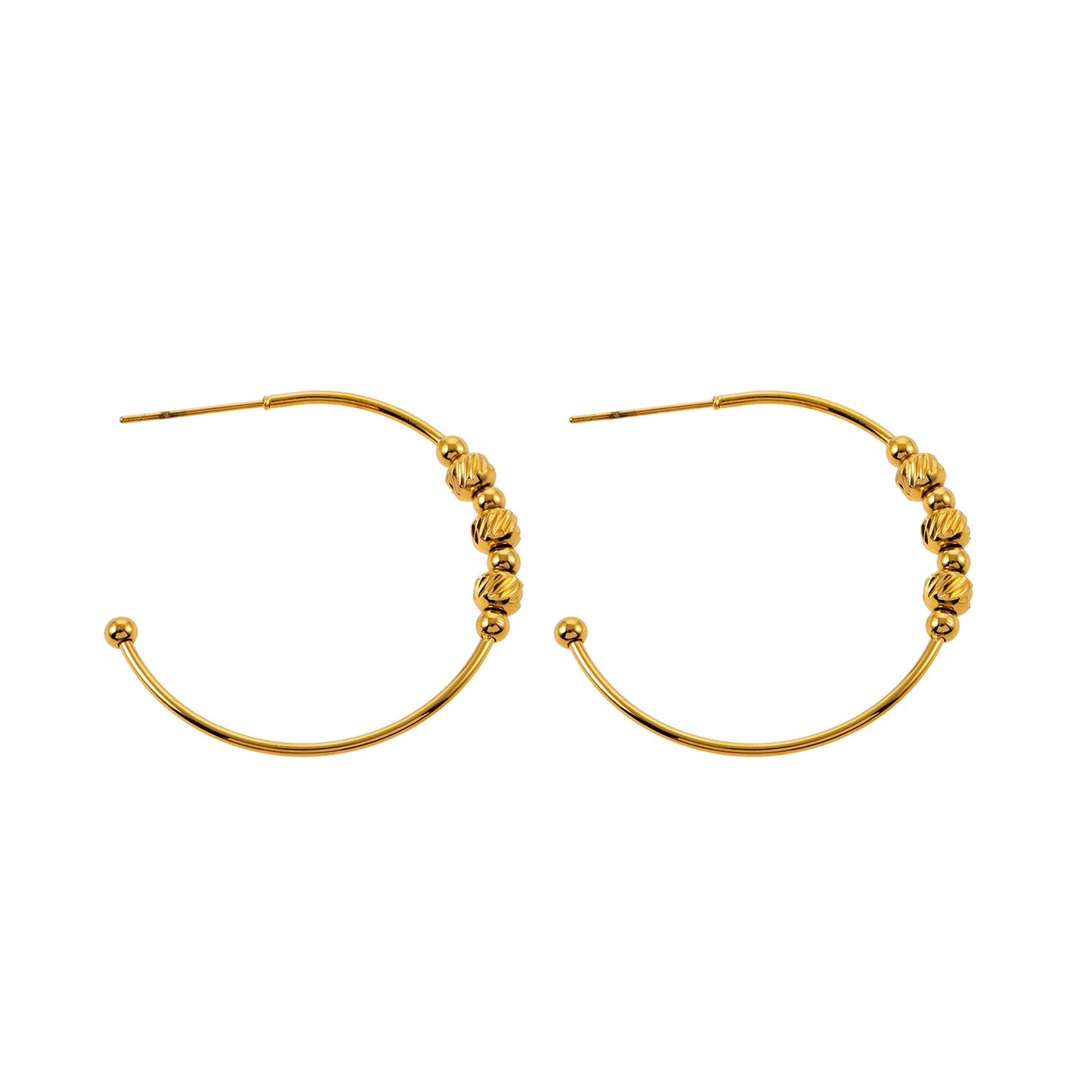 CHARIS: Classic Round Hoop Earrings Anchoring a Bevy of Charm Beads