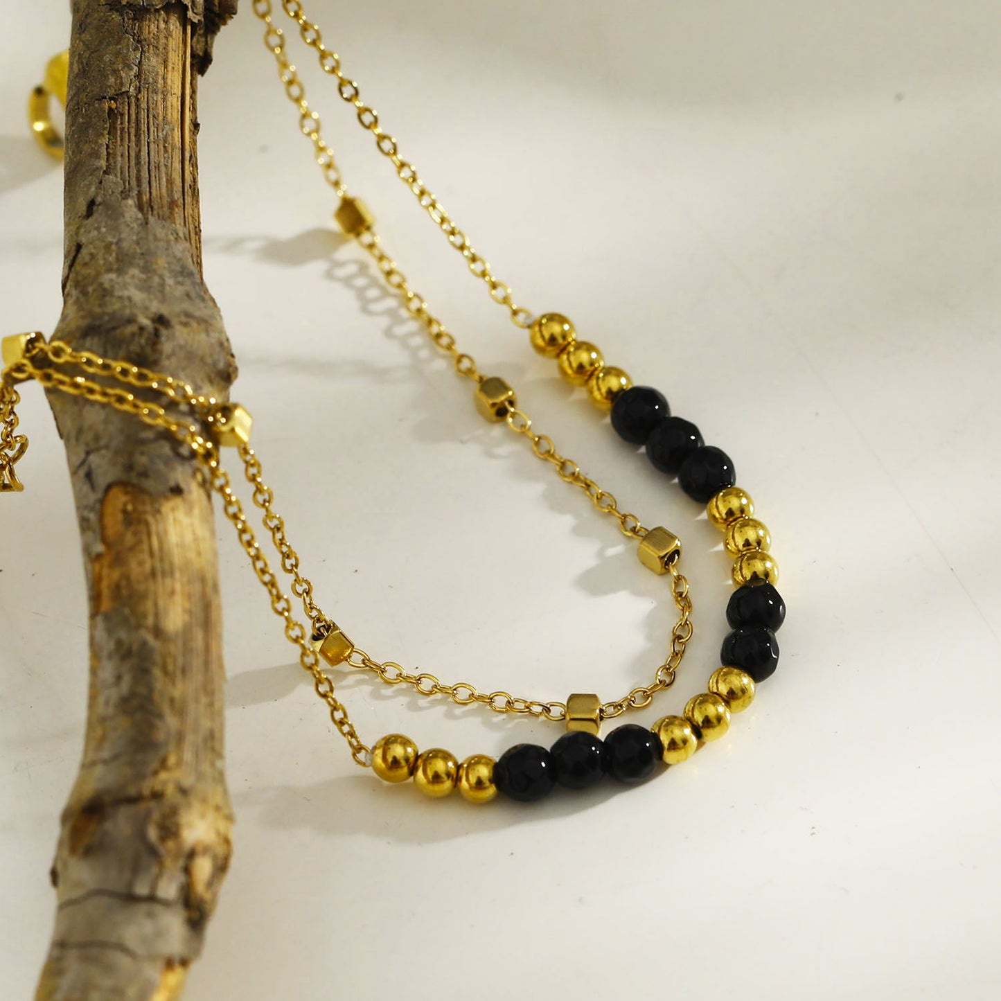 HILDA: Two-in-One Square Beads & Round Beads in Black & Gold Bracelet.