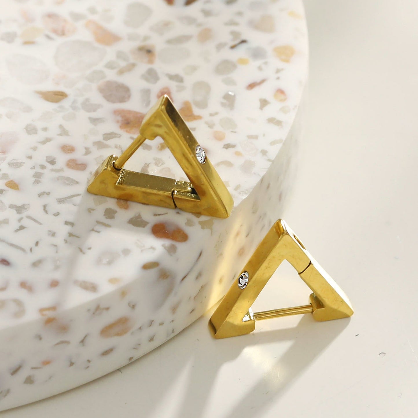 AMIRA: Triangle Shaped Mini Hoop Earrings with Solitaire Zirconia.