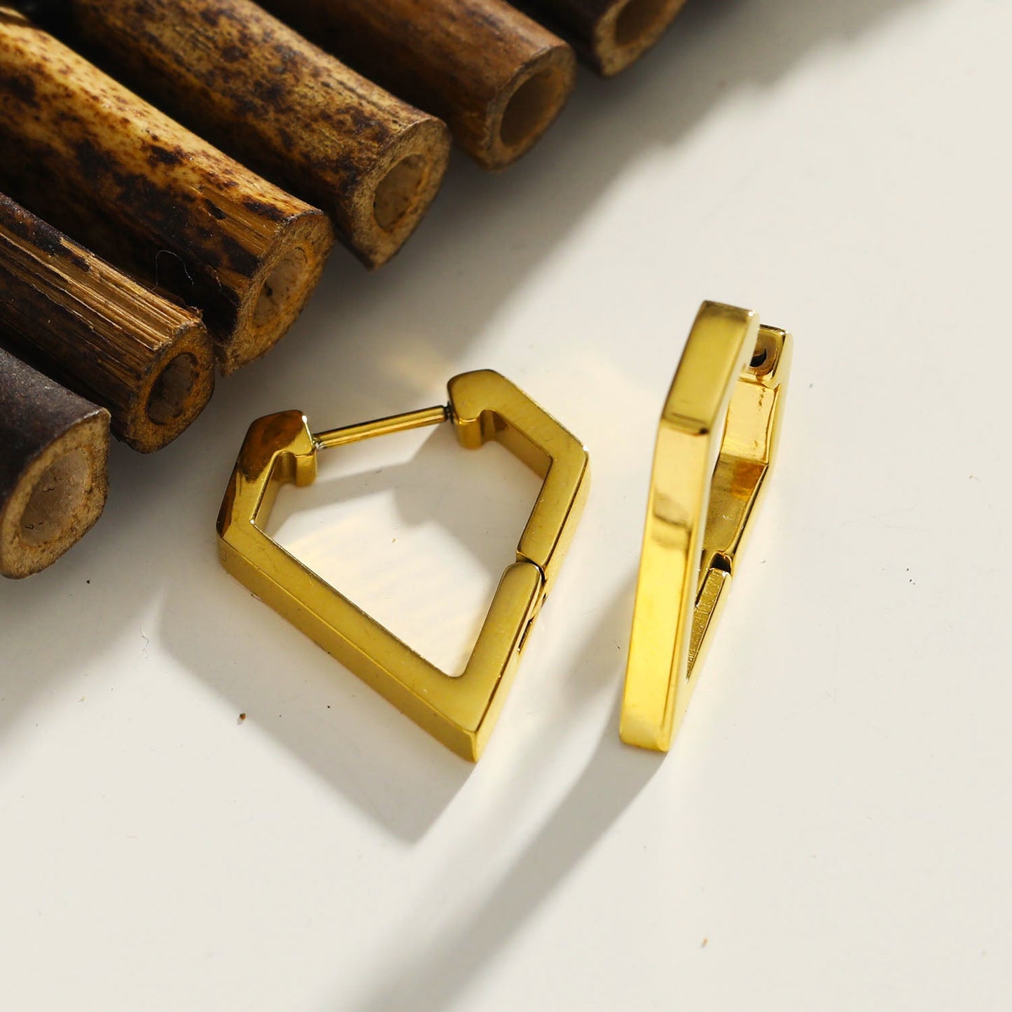 CAGLIARI: Triangle Shaped Contemporary Hoop Earrings in Gold