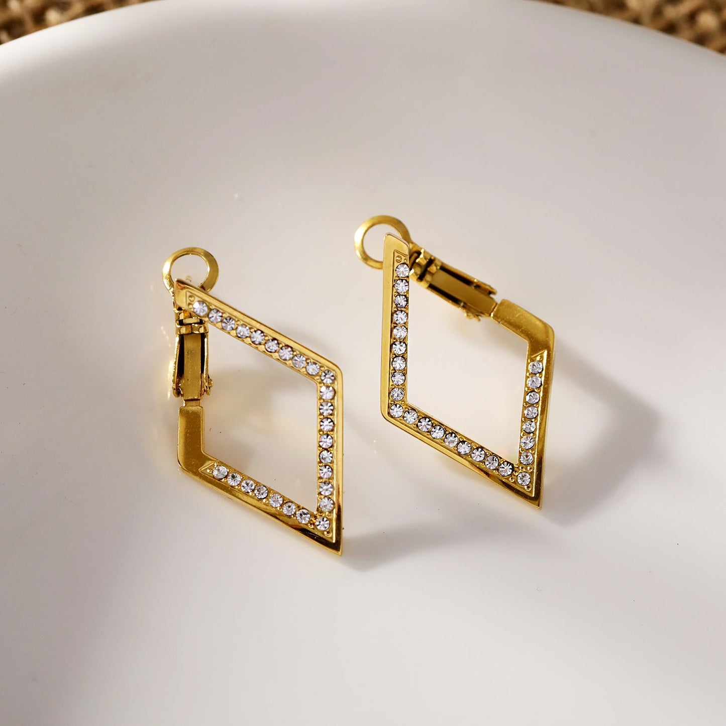 ALMA: Twisted Diamond Shaped Hoop Earrings Embedded with Zirconia Gemstones