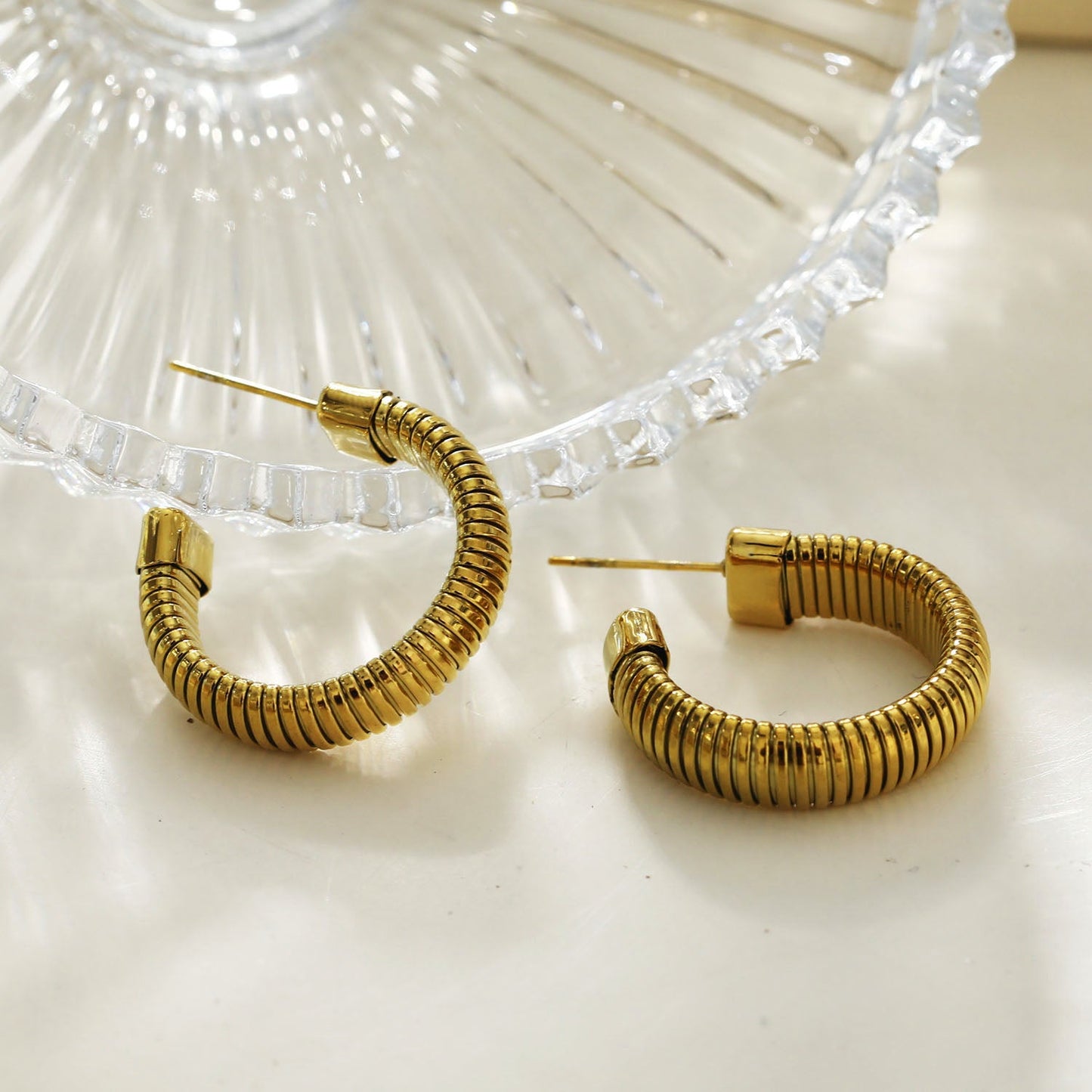 Style ABRIOLA: Textured Geometric Hoop Earrings