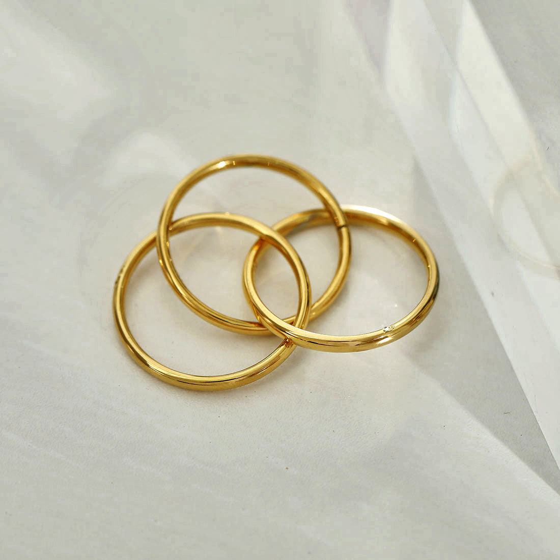 ESTELLA: Triple Banded Interconnected Stack Ring in Gold