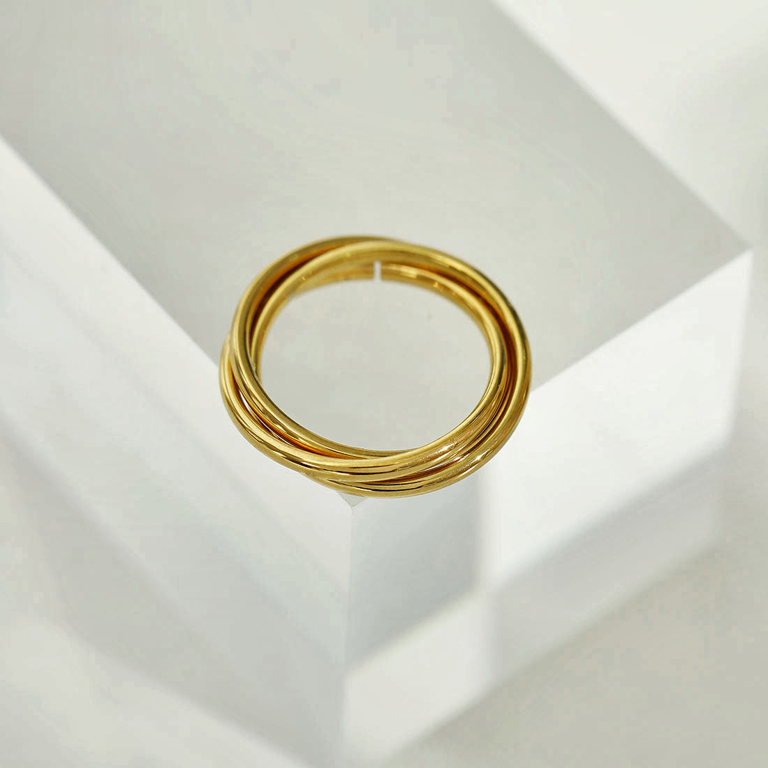 ESTELLA: Triple Banded Interconnected Stack Ring in Gold