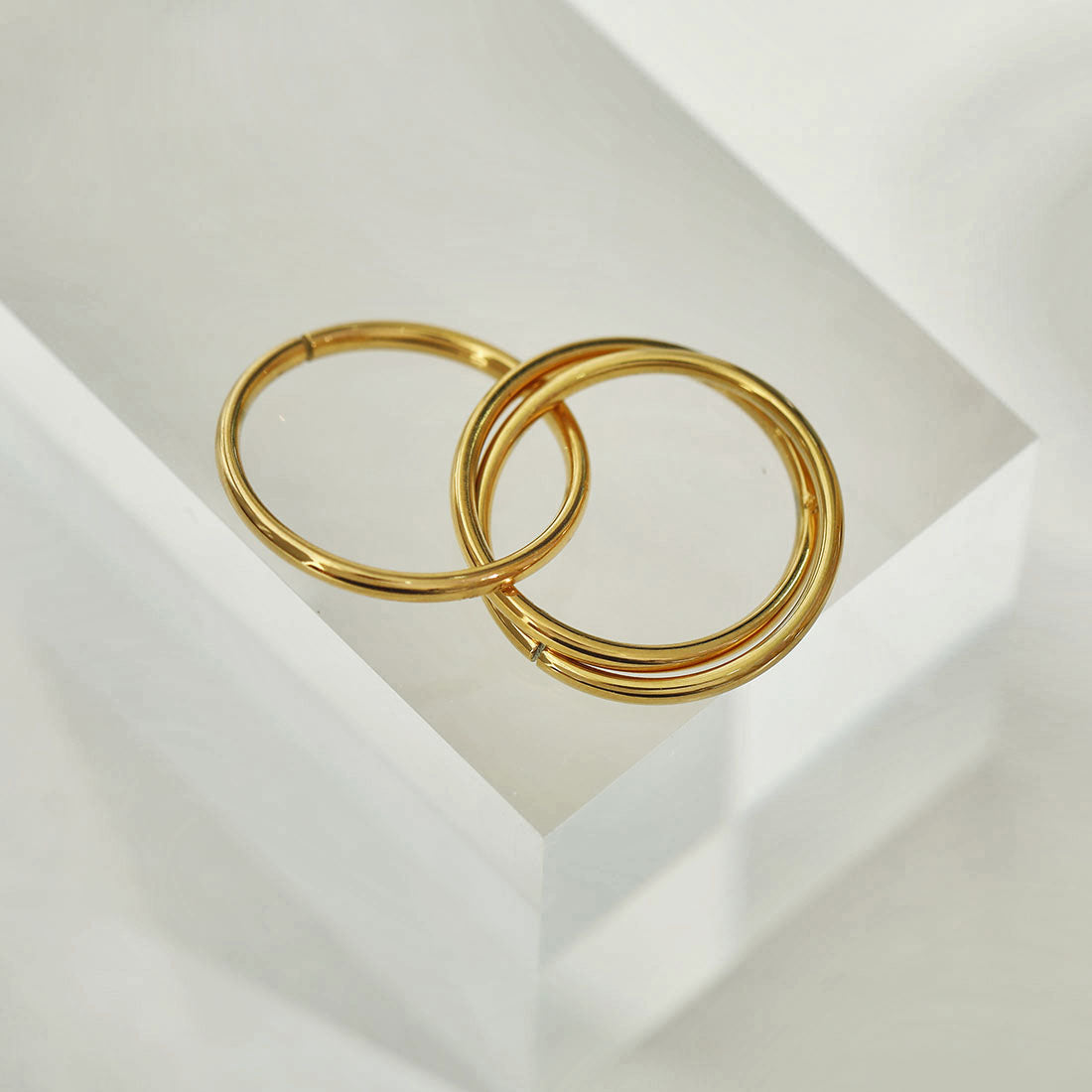 ESTELLA: Triple Banded Interconnected Stack Ring in Gold