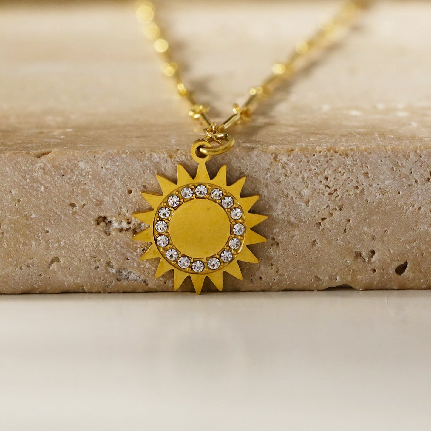 NOMIA Gold: Radiant Sunburst Pendant Zirconia Chain Necklace