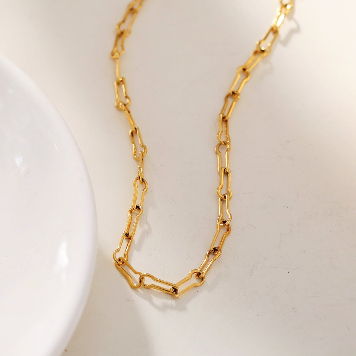 TIASA: Asymmetrical Paper Clip Gold Chain Necklace
