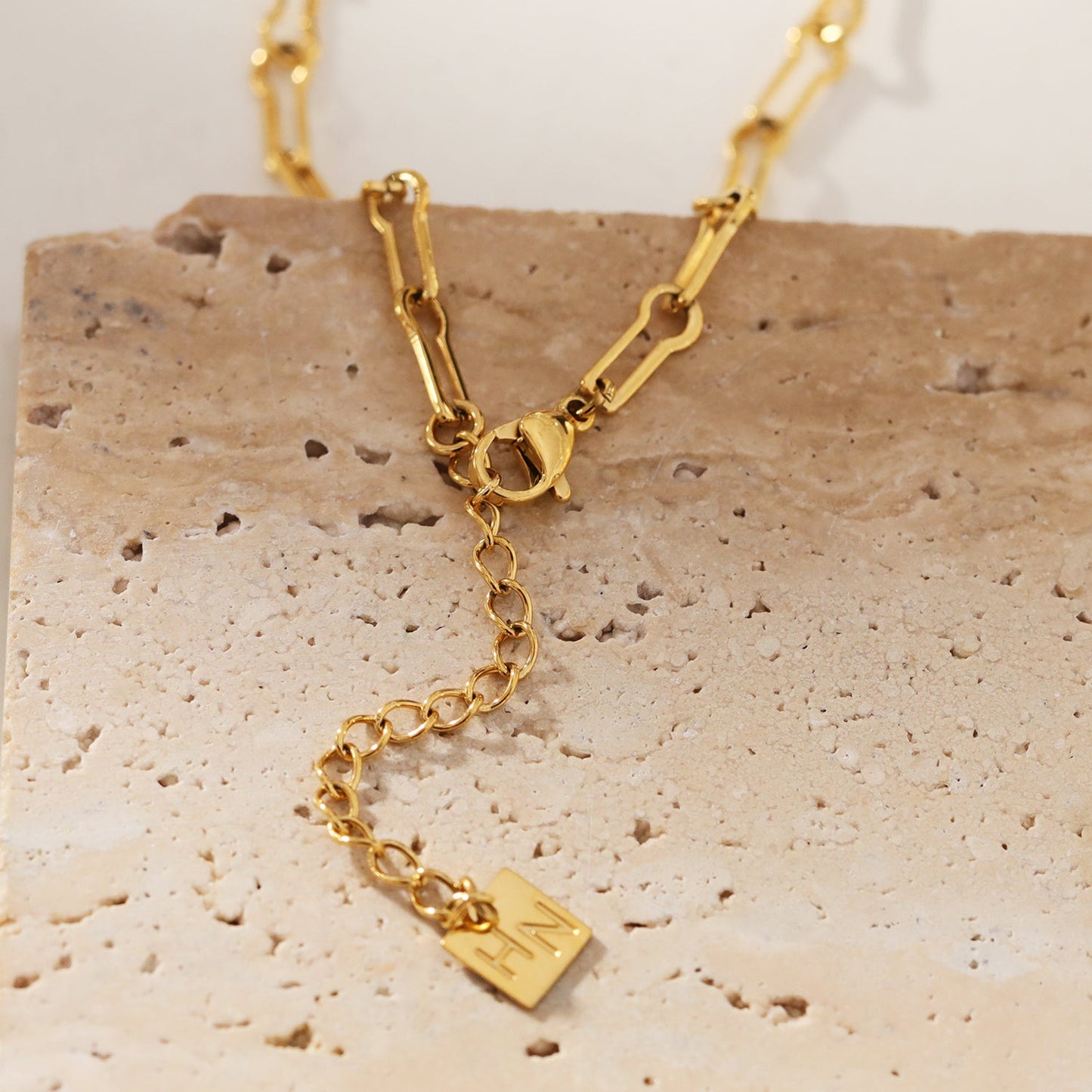 TIASA: Asymmetrical Paper Clip Gold Chain Necklace