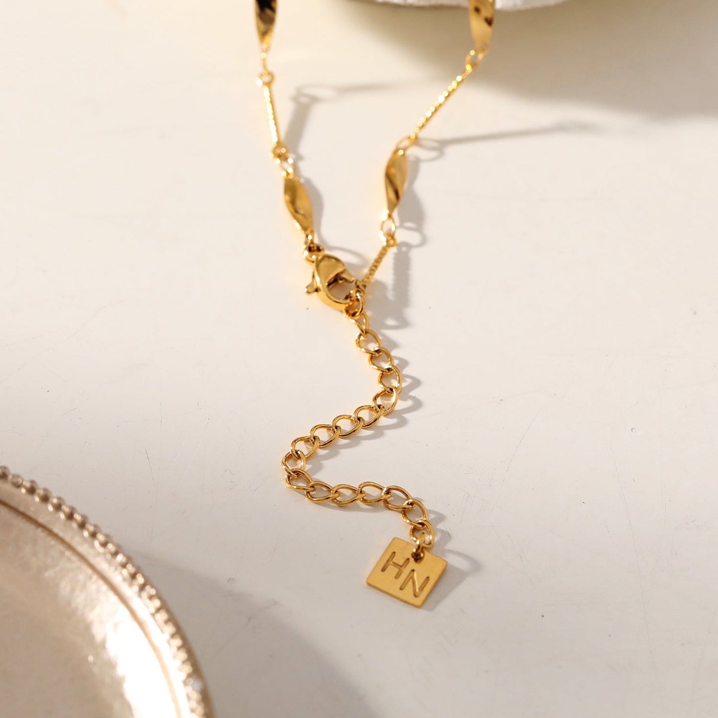 OTTIS: Twisted Oval Links & Textured Bars Chain Necklace