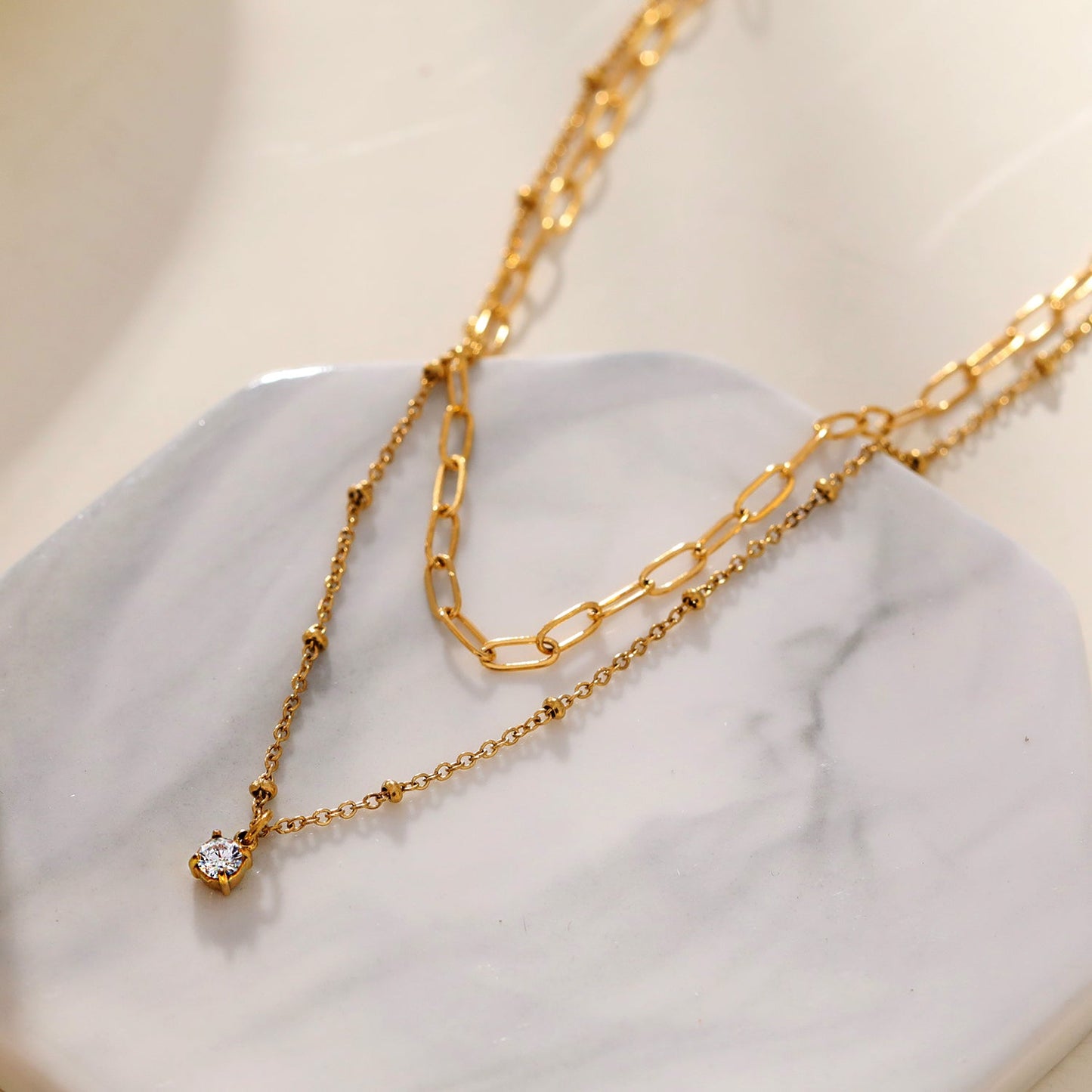 KATERI Gold: Pre-Layered Chains Necklace with a Solitaire Zirconia Charm Pendant