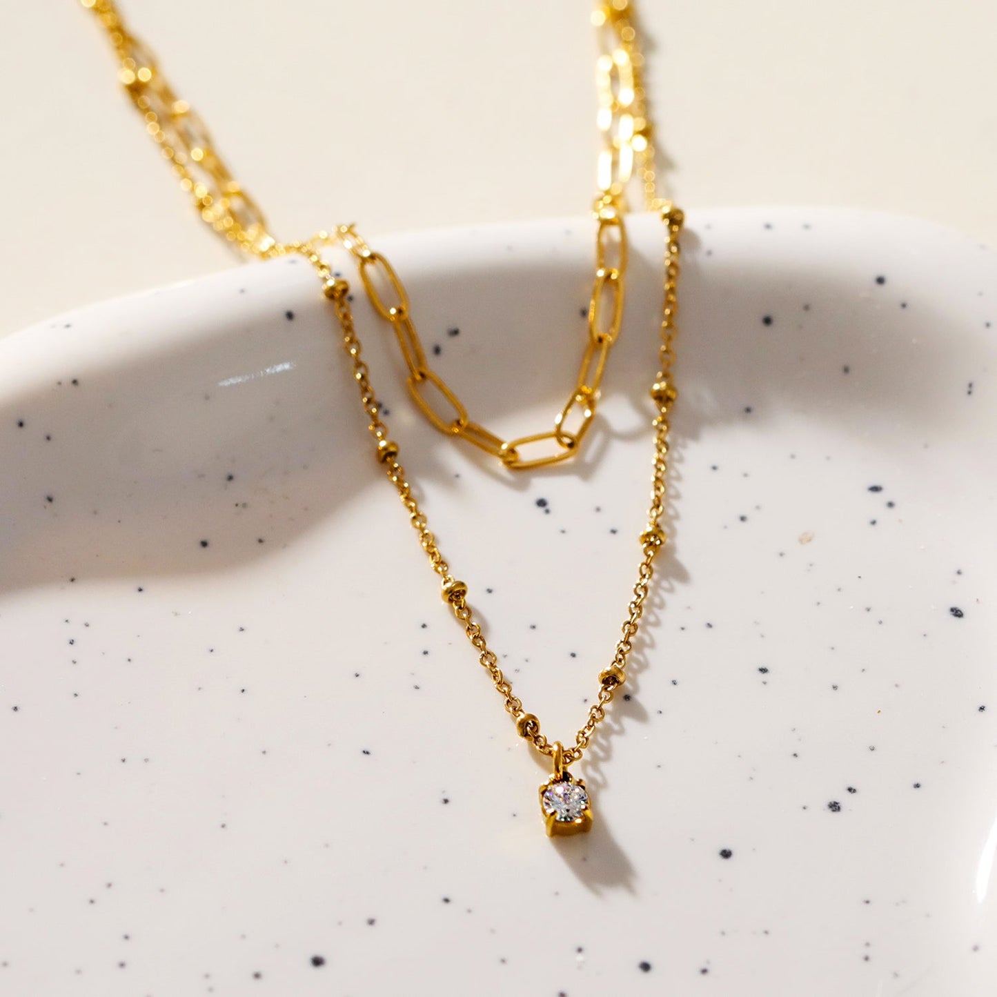 KATERI Gold: Pre-Layered Chains Necklace with a Solitaire Zirconia Charm Pendant