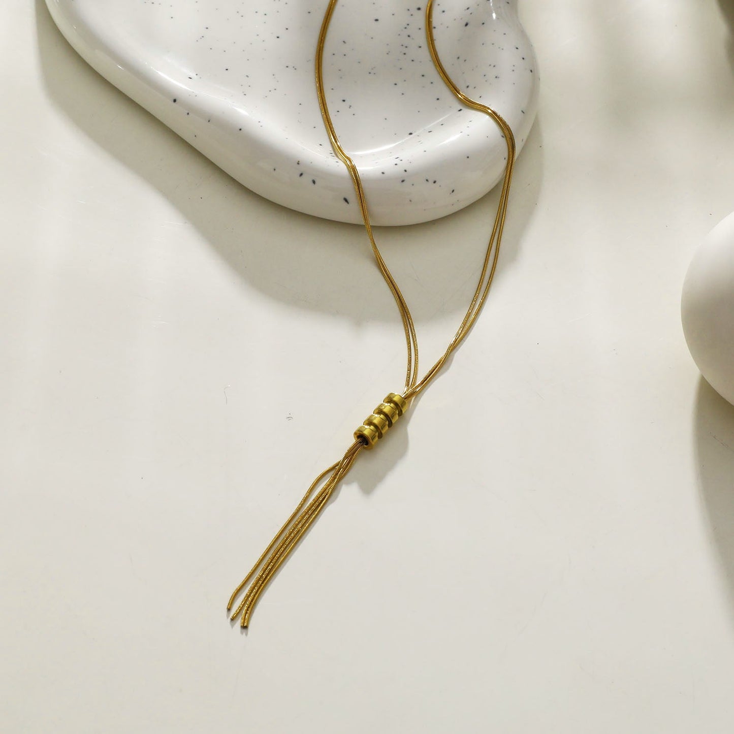 TELMA: Lariat Style Multi Stranded Necklace.