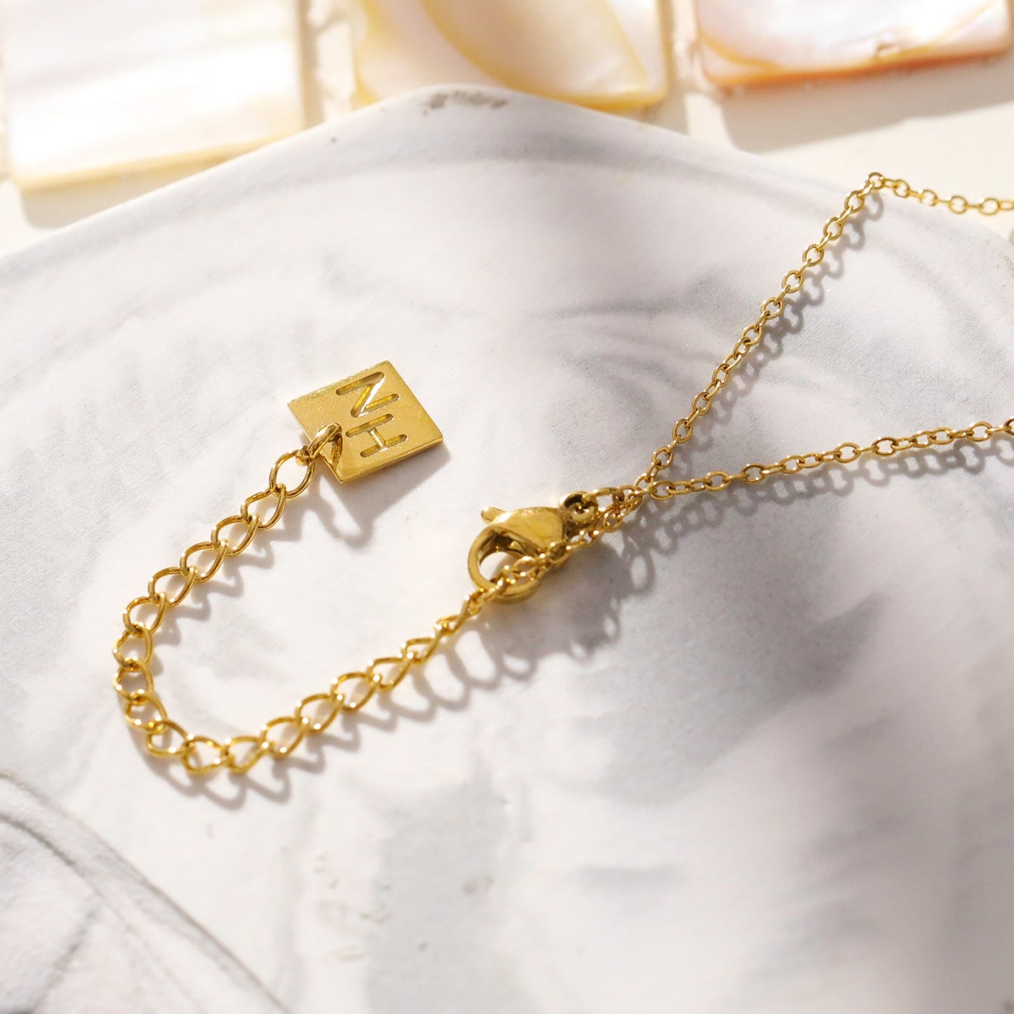 Style BUCKIE:  Multi Pendant Zirconia Chain Necklace