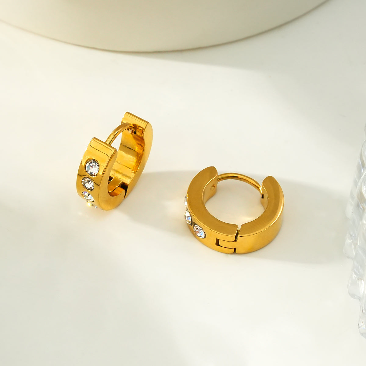 PAIA Gold: Wide Mini Hoop Earrings with an Array of Zirconia (CZ) Gemstones