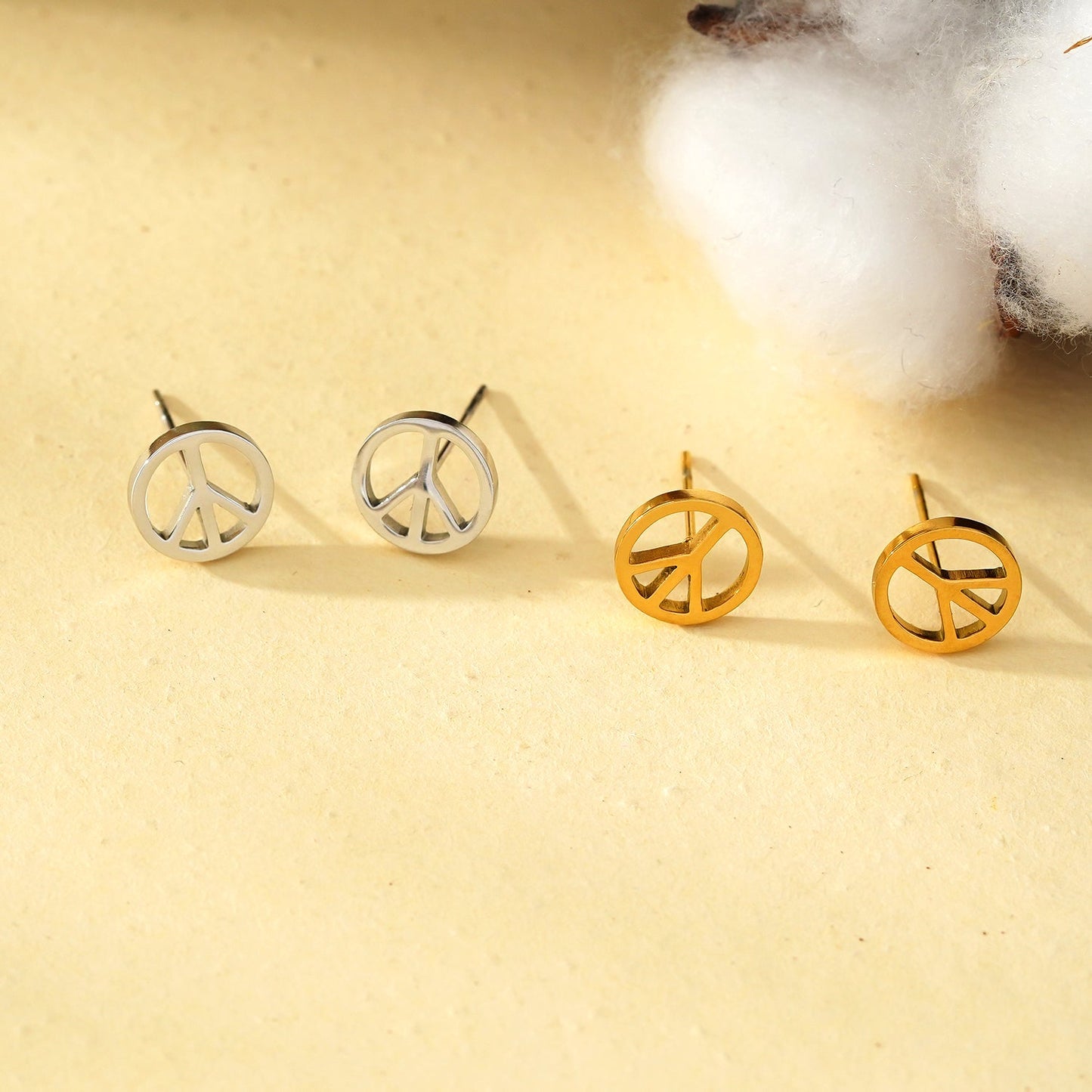 PEACE Logo Stud Earrings in Silver Tone (White Gold)