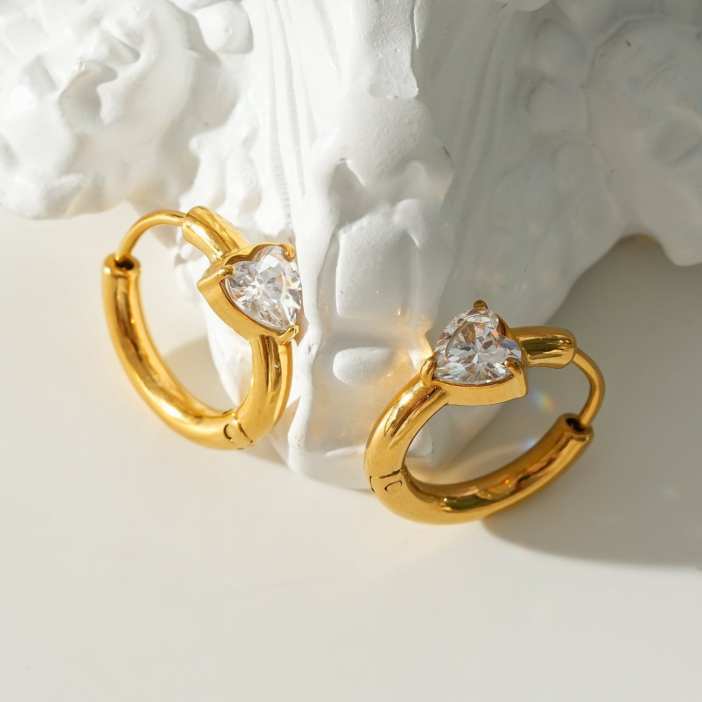Style PELLA Gold: Mini Hoop Gold Earrings with Heart Shaped Moissanite