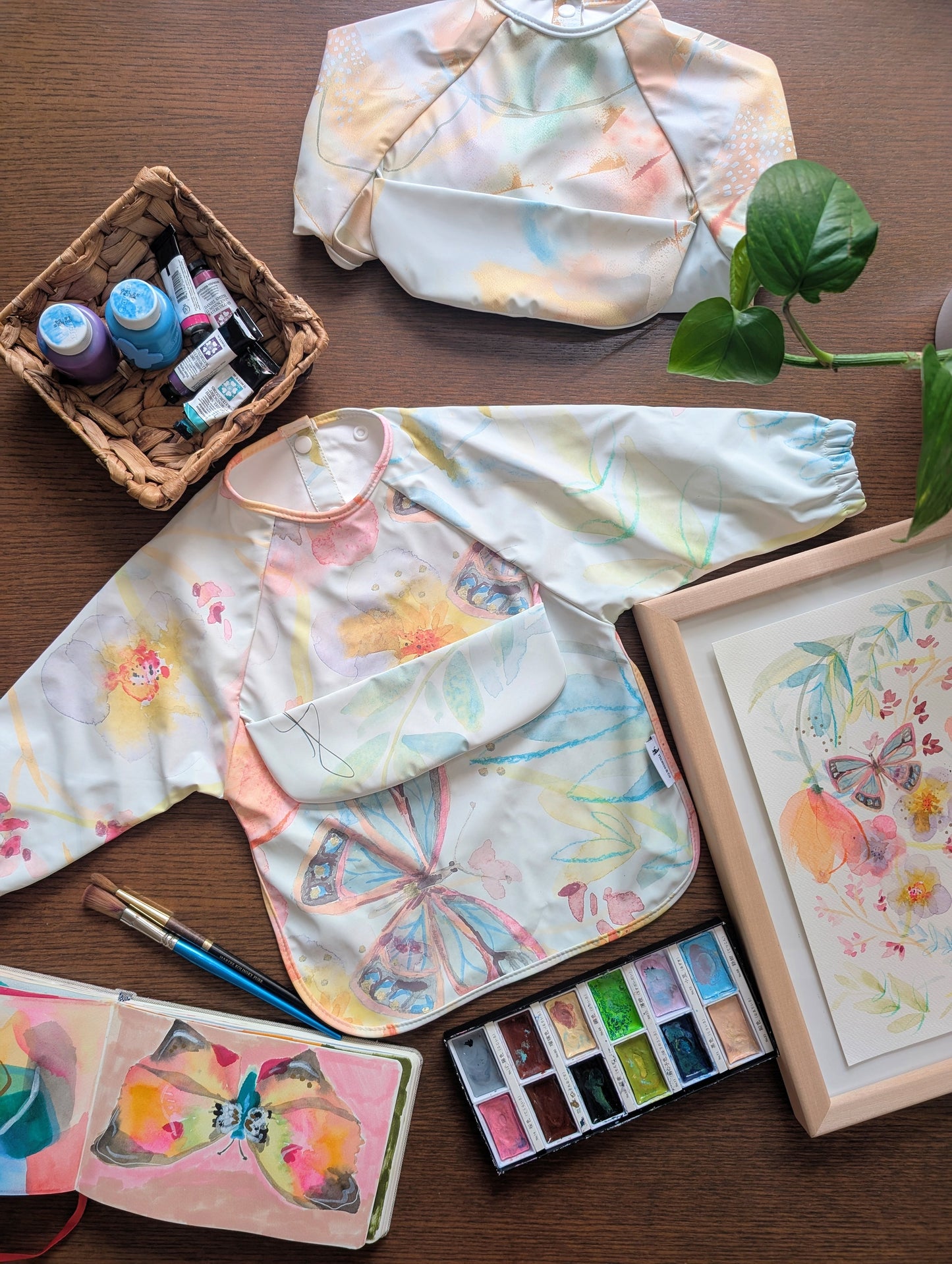 Bavette à manches longues avec pochette intégrée