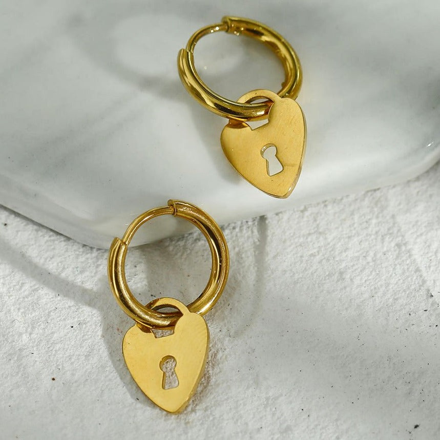 Mini Hoop Earrings Anchoring a Heart Shaped Keylock Charm - Style PYAR in Gold