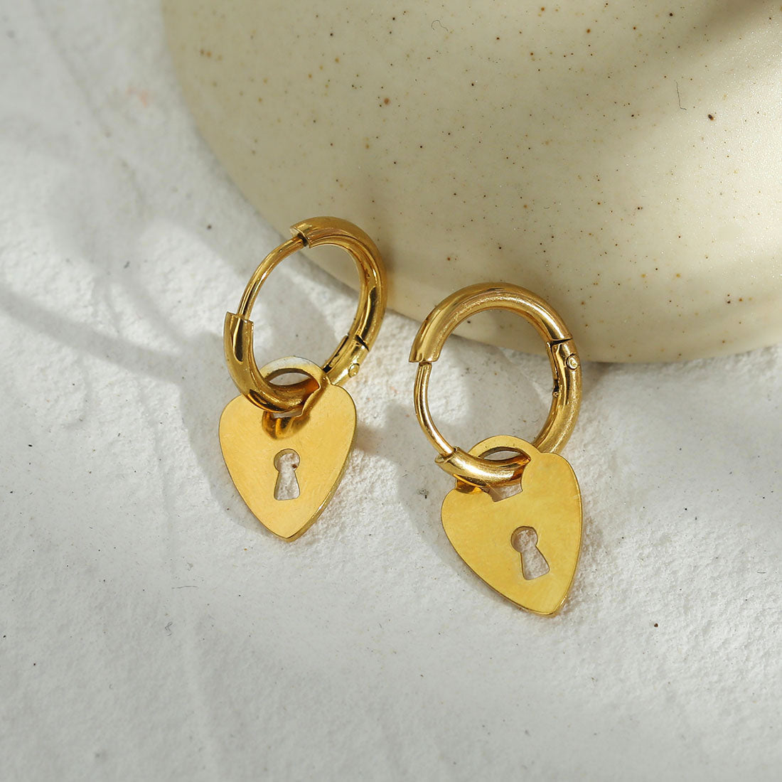 Mini Hoop Earrings Anchoring a Heart Shaped Keylock Charm - Style PYAR in Gold