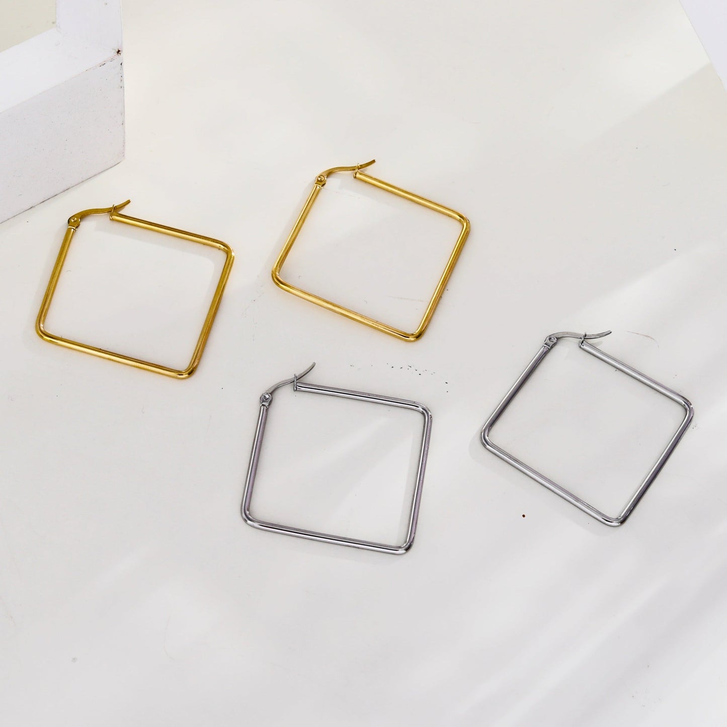REILYNN: Square Silver Hoops - A Bold Twist on Classic Elegance