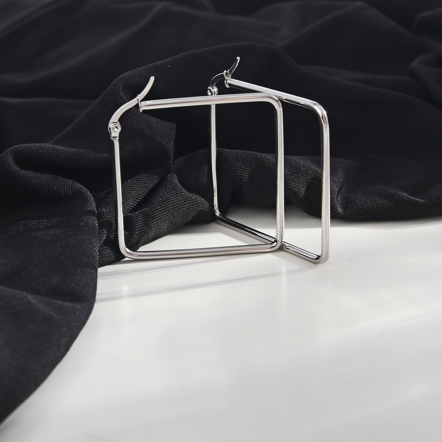 REILYNN: Square Silver Hoops - A Bold Twist on Classic Elegance