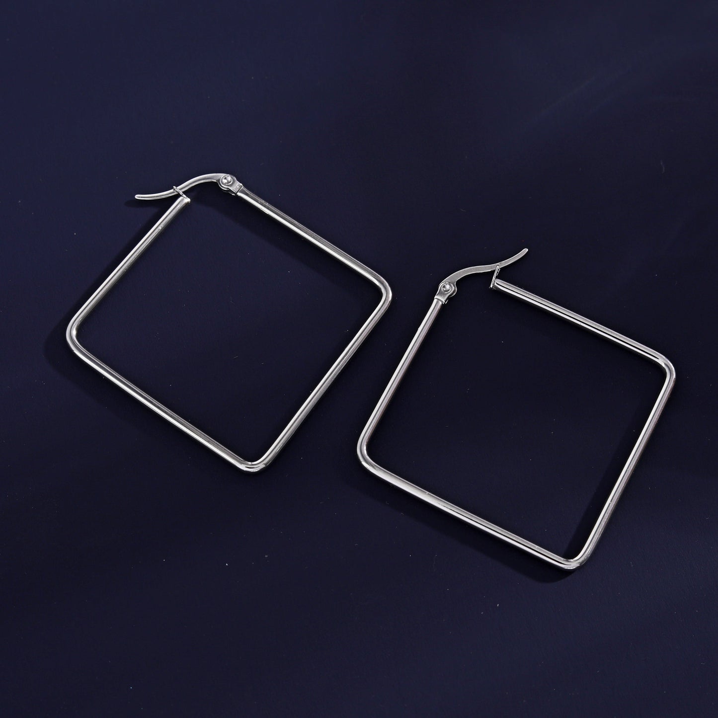 REILYNN: Square Silver Hoops - A Bold Twist on Classic Elegance
