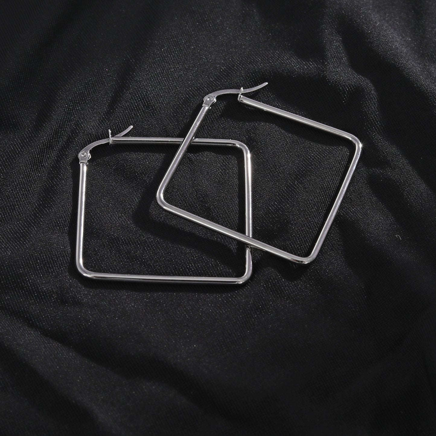 REILYNN: Square Silver Hoops - A Bold Twist on Classic Elegance