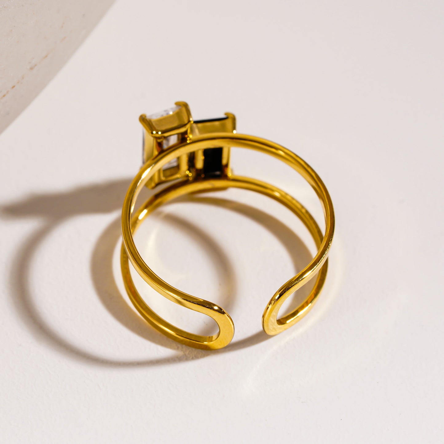 RIADEL: Dual-Radiance Black & Clear Zirconia Banded Ring