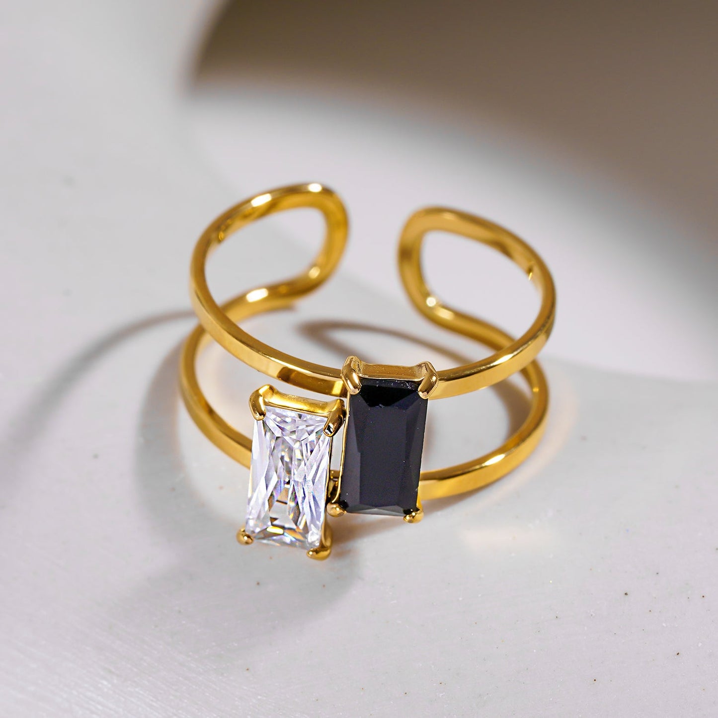 RIADEL: Dual-Radiance Black & Clear Zirconia Banded Ring