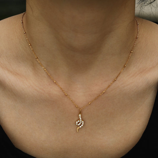 RIHANNA Beaded Chain Necklace with a Pavé Zirconia Serpent Pendant in Gold