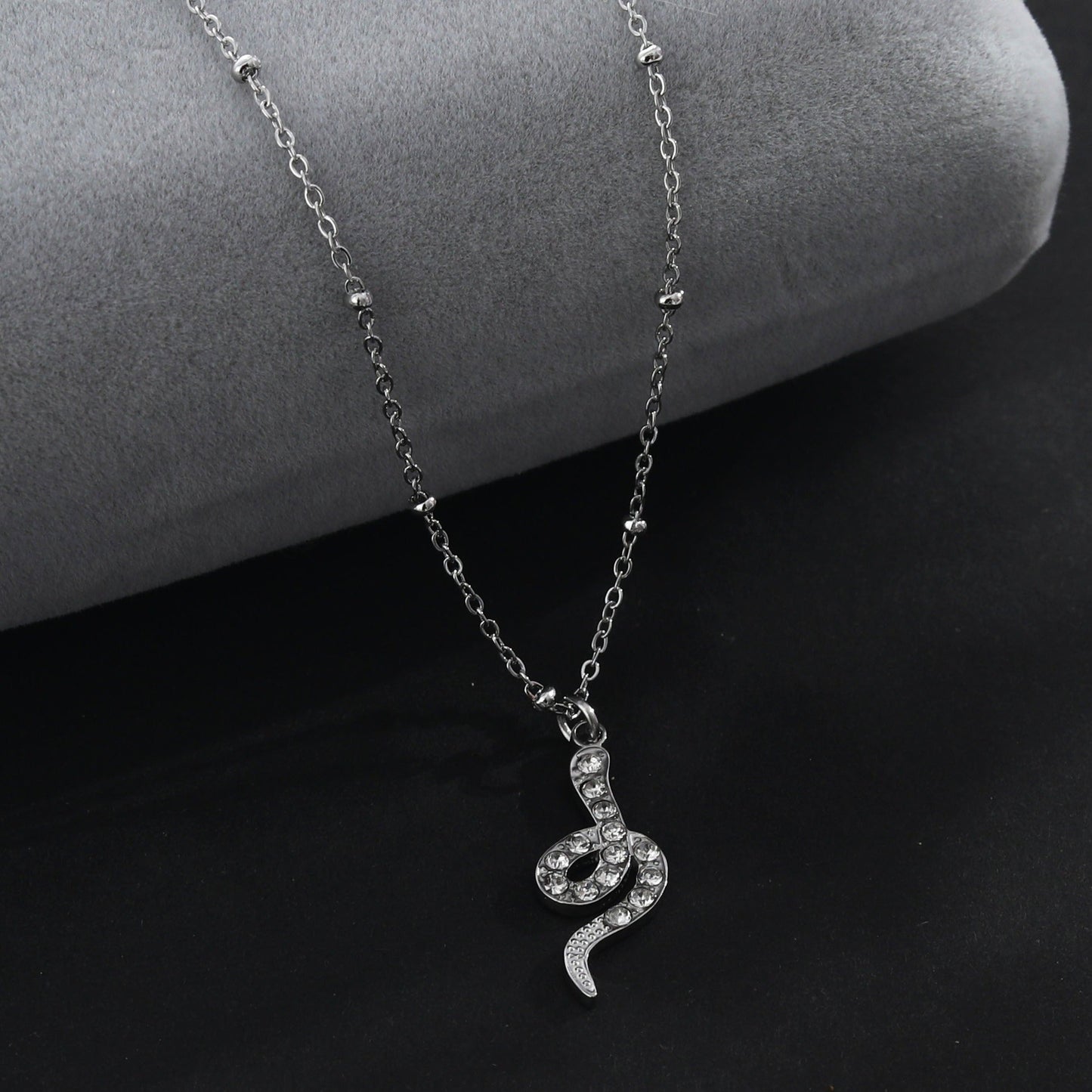 RIHANNA Beaded Chain Necklace with a Pavé Zirconia Serpent Pendant in Silver