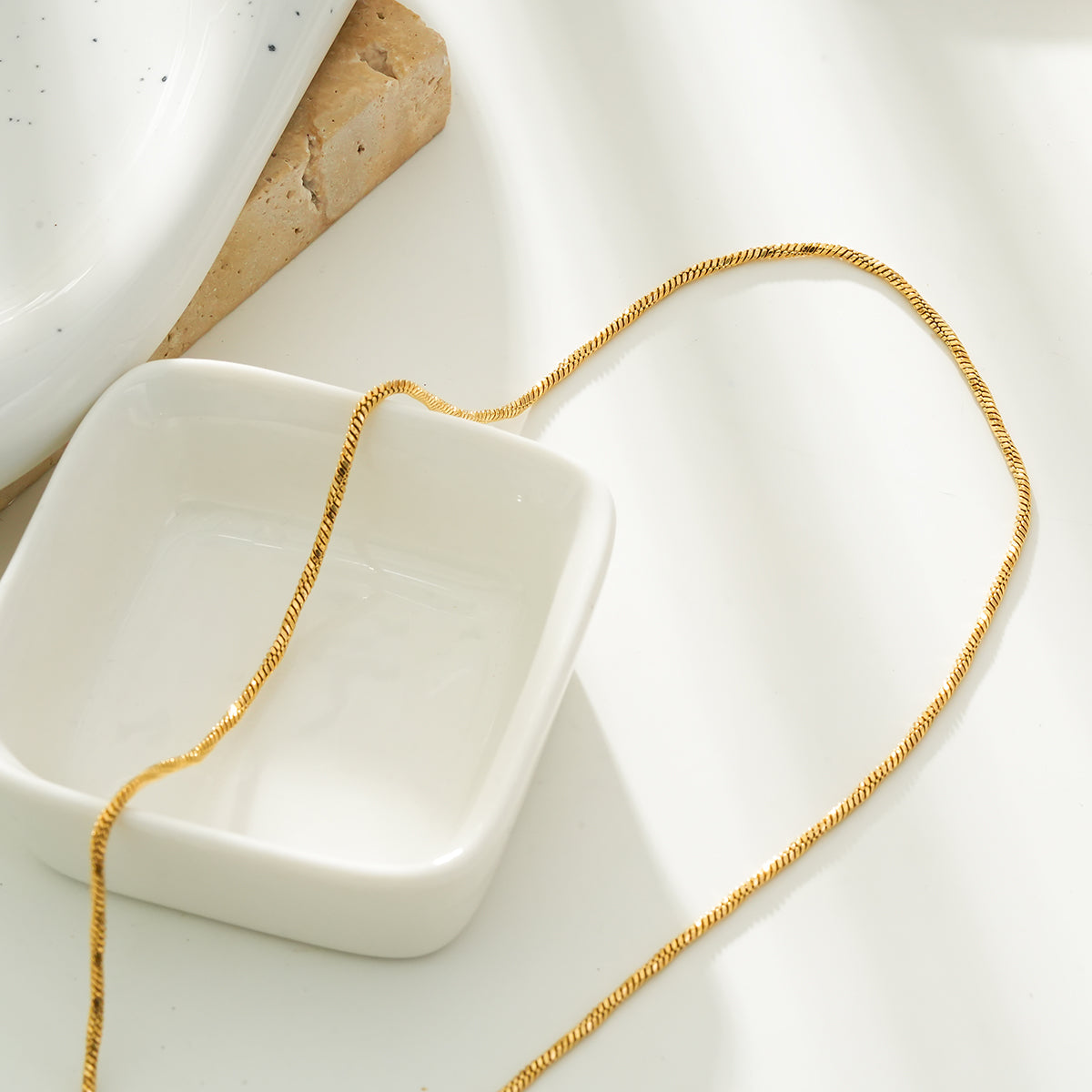 SKAGWAY: Minimalist Twisted Textures Chain Necklace in Gold