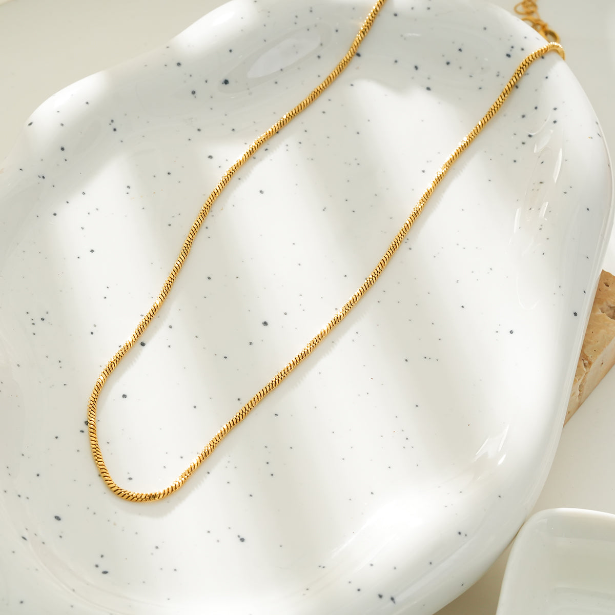 SKAGWAY: Minimalist Twisted Textures Chain Necklace in Gold