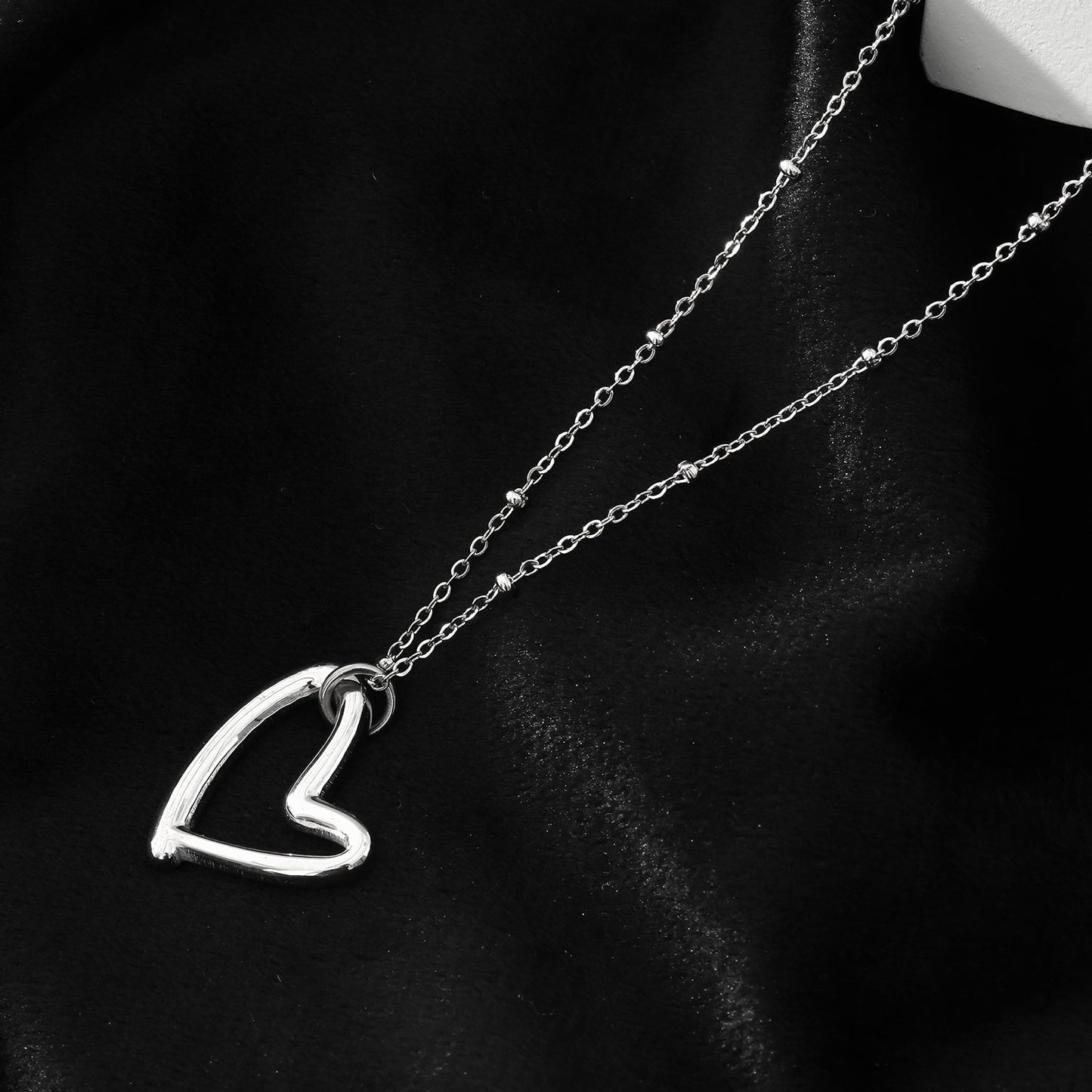 SMITTEN Silver (White Gold): Dainty Beaded Chain Anchoring an Abstract Heart Shaped Pendant