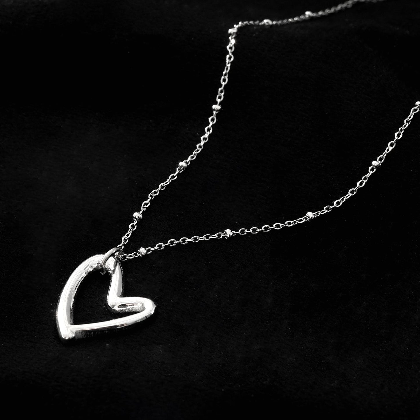 SMITTEN Silver (White Gold): Dainty Beaded Chain Anchoring an Abstract Heart Shaped Pendant