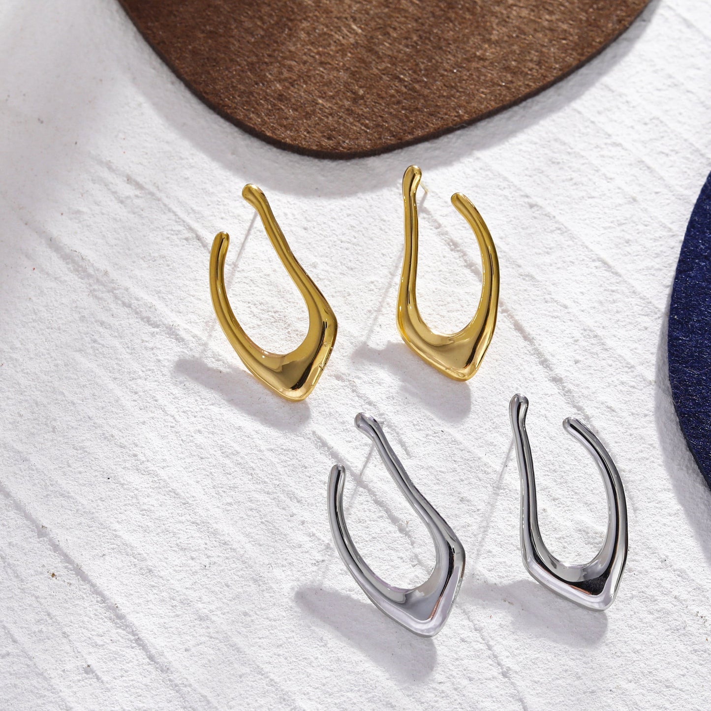 TARAJI Abstract Shaped Hoop Earrings in Gold