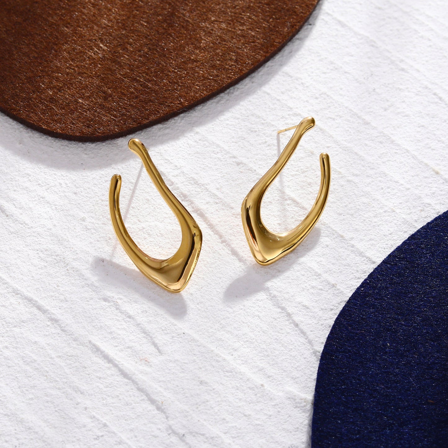 TARAJI Abstract Shaped Hoop Earrings in Gold