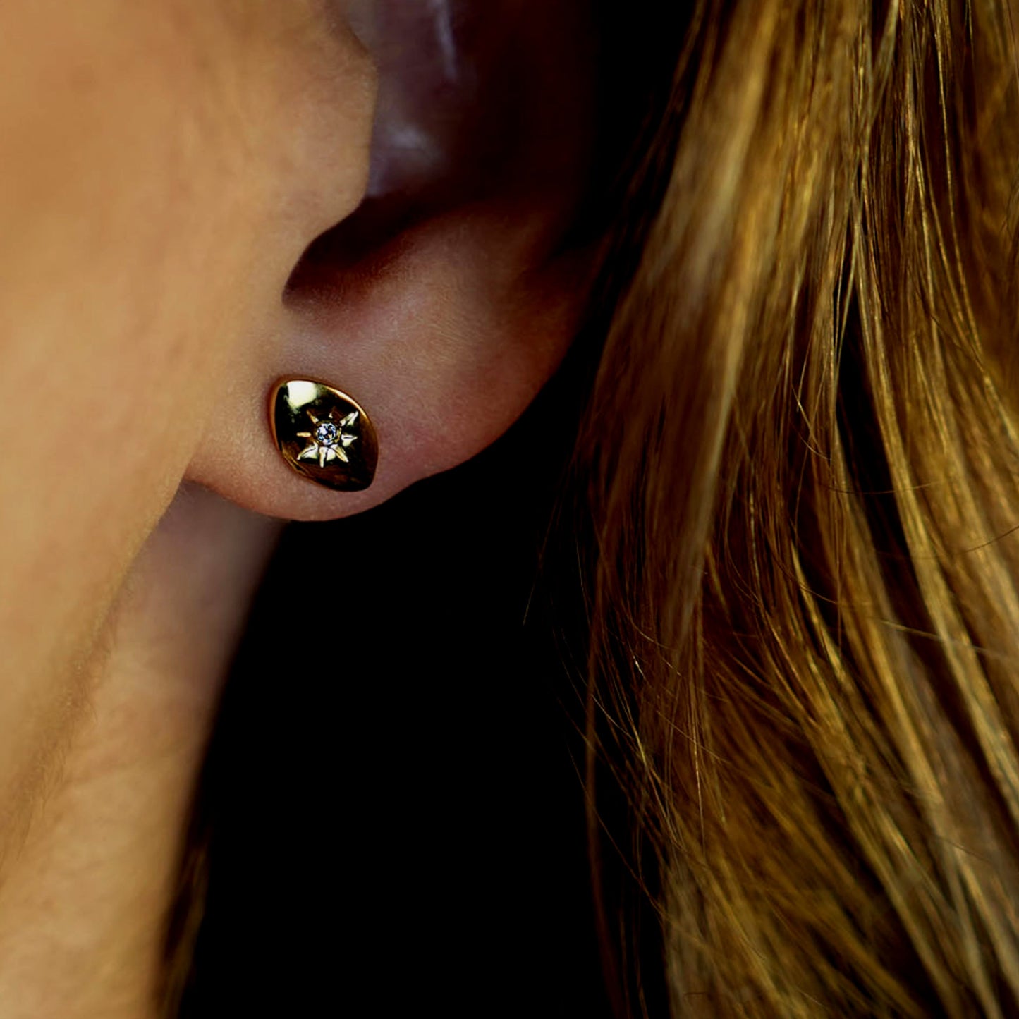 TINDRA: Oval Shaped Gold Stud Earrings Featuring a Solitaire Zirconia