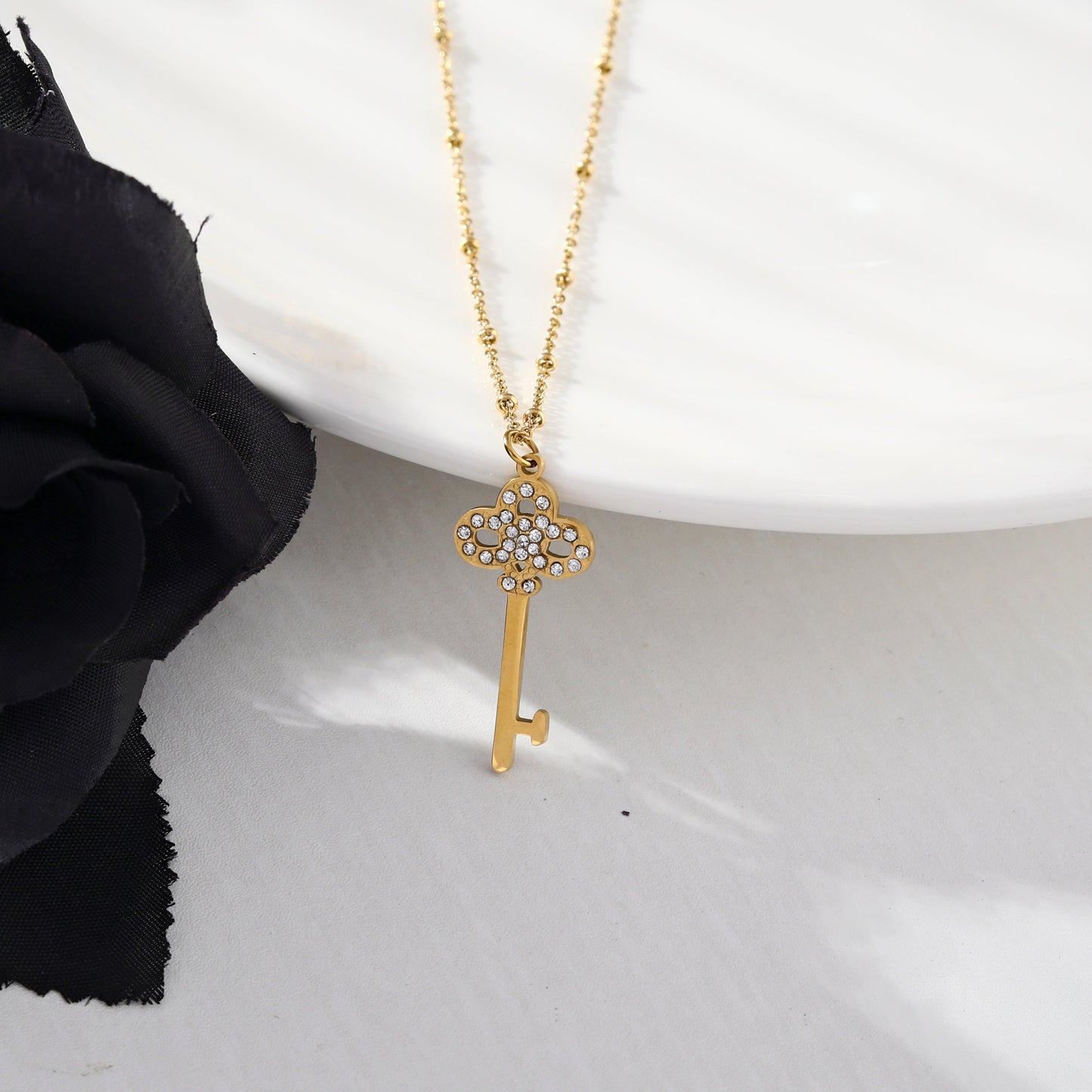 UNLOK Beaded Gold Chain with Zirconia Embellished Key Pendant