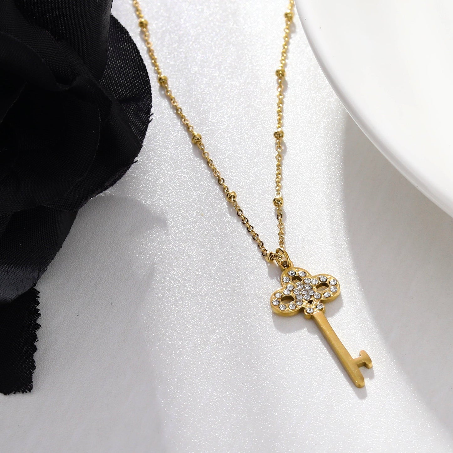 UNLOK Beaded Gold Chain with Zirconia Embellished Key Pendant
