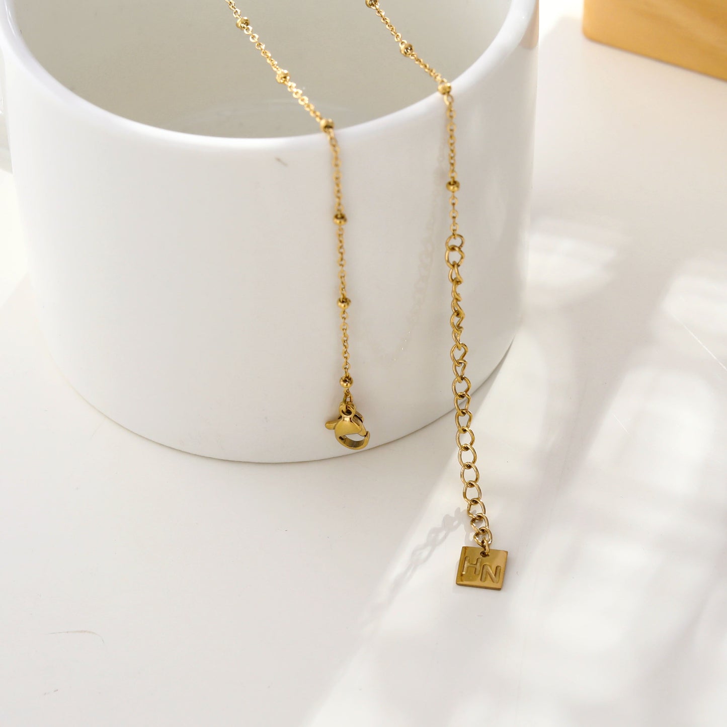 URIKA Beaded Chain Necklace with  Zirconia Pavé Triangle Pendant in Gold